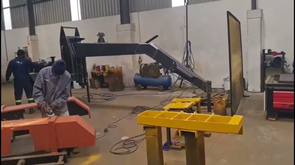 Roadking fabrication team at work on the factory floor